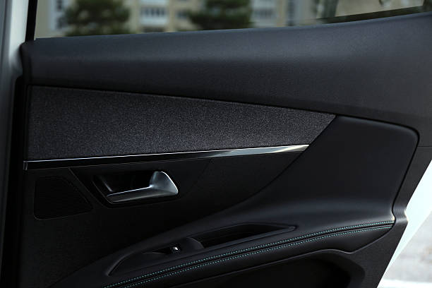 istock Closeup view of black car door inside modern automobile 2208329200