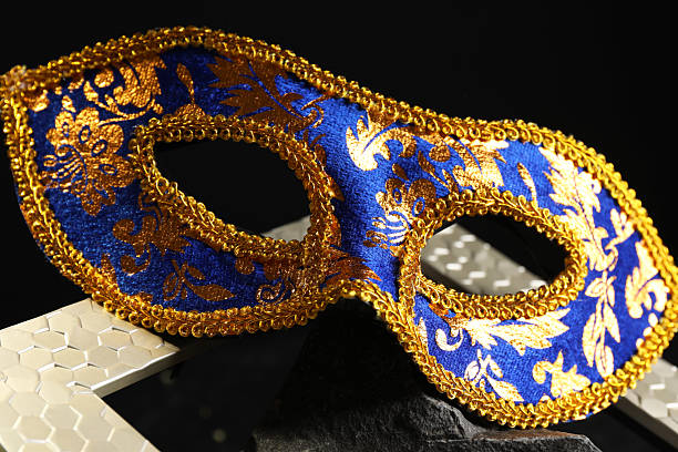 istock Beautiful carnival mask on dark background, closeup 2208329309
