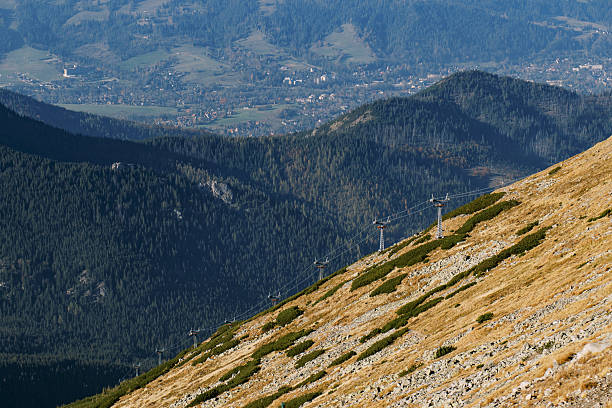 istock Mountain landscape with cable car pillars 2208330550