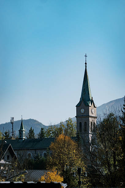 istock Church Tower Against a Clear Blue Sky 2208331639