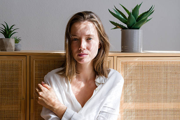 istock Young woman posing in her modern apartment with plants 2208338595
