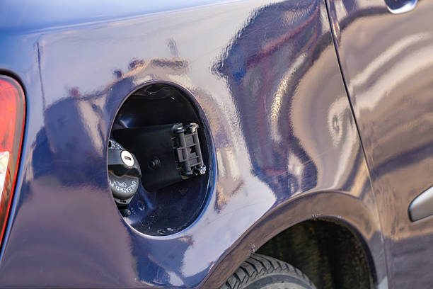 istock broken fuel filler flap in a car 2208339353