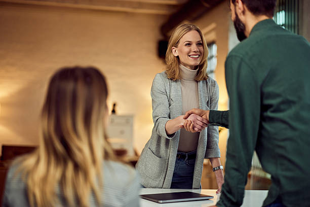 istock Professional Business Meeting with Handshake in a Modern Office Setting 2208343952