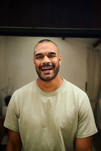 istock Young aboriginal australian man smiling at home in the morning 2208354344