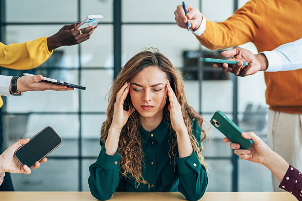 istock Overwhelmed Professional in a Busy Environment 2208356624
