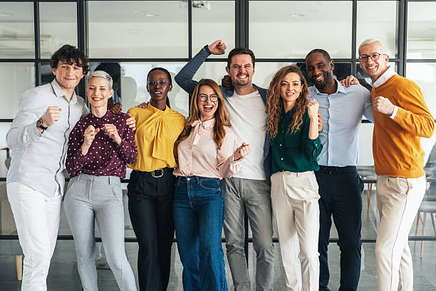 istock Diverse Team Celebrating Success Together 2208356633