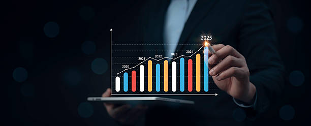 istock Business growth chart showing rising graph with businessman using tablet. Financial data analysis, market trends and success concept. Ideal for finance, economy and corporate themes 2208358002