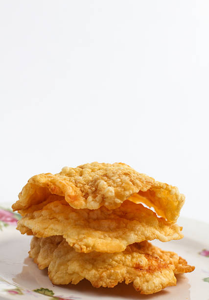 istock close up Indonesian snack called emping melinjo with white background 2208358766