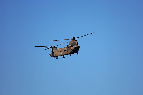 istock Ch47 chinook army helicopter flying 2208358809