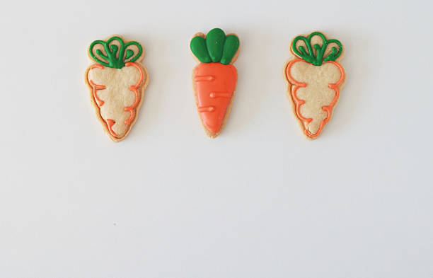 istock Carrot-shaped easter cookies on a white background. Holiday concept with copy space. 2208362241