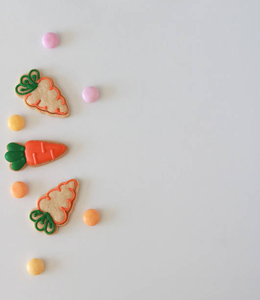 istock Carrot-shaped easter cookies on a white background. Holiday concept with copy space. 2208362267