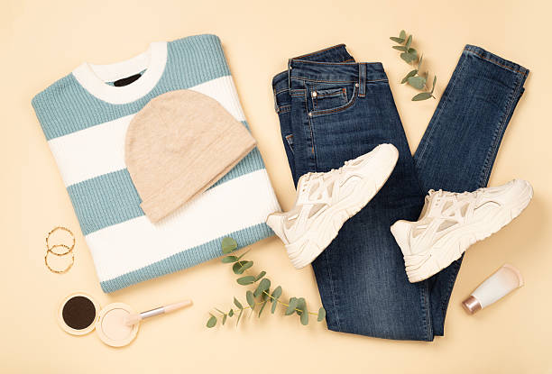 istock Flat lay with women's trendy spring outfit on beige background, top view 2208366060