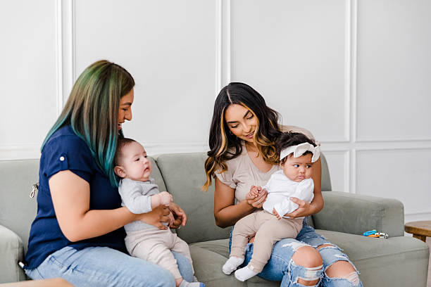 istock Two Diverse Mothers Bonding with Their Adorable Babies 2208371139