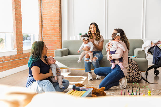 istock Group of mothers supporting each other with their babies 2208371166