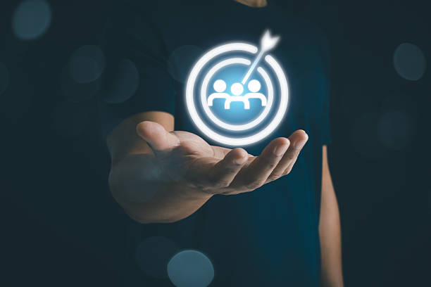 istock Target audience, buyer persona, customer behavior concept. Personalization marketing, client centric strategies, Brand research analysis technology. Business people hand show target customer on screen 2208374484