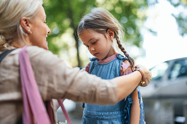 istock Loving Moment Between Mother and Daughter Preparing for School 2208374686