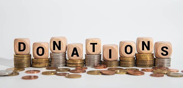 istock The word DONATIONS is spelled out on wooden blocks, 2208375213
