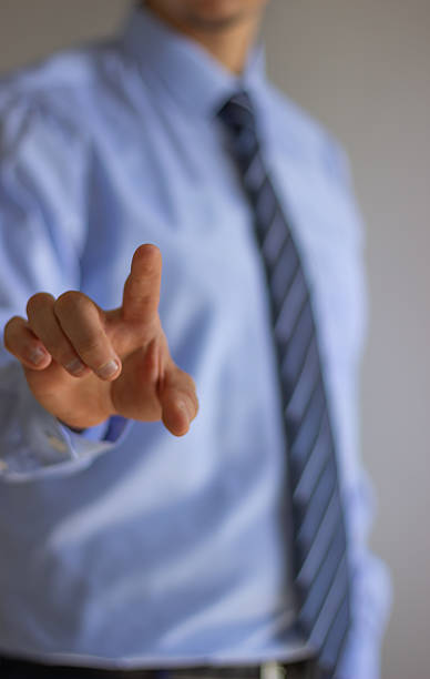 istock portrait-businessman-pointing-his-finger 2208376662