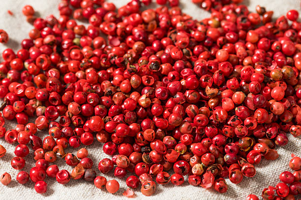 istock Organic Spicy Red Pink Peppercorns 2208382573