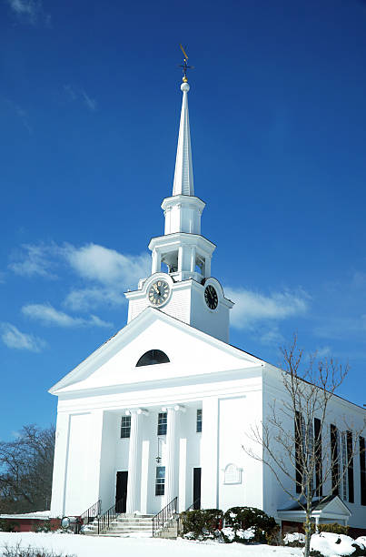 istock winter church in winter sunny day 2208402755