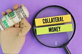 ohne-lupe-papiergeld-und-farbiges-papier-mit-dem-wort-collateral-money-das-konzept-der.jpg?b=1&s=170x170&k=20&c=DtiqqG7I5Qk8lCsdWq1NgFwCEI2rzSURSDlzTrHIVb8=