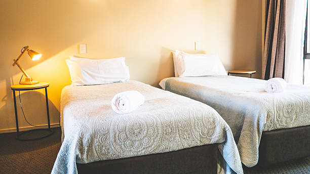 istock Room interior modern hotel pillows beds chair lounge rolled towel 2208405955