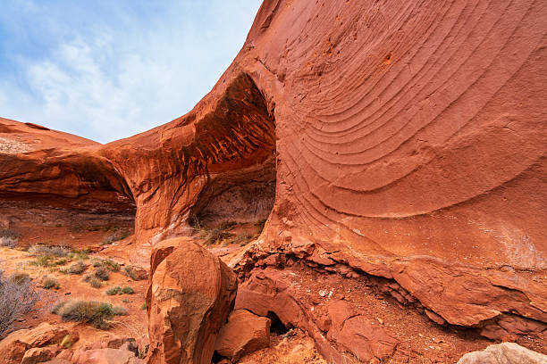 Canyon Grotto Cave in Sandstone Red Rock - Scenic desert area with eroded caverns and interesting rock formations.