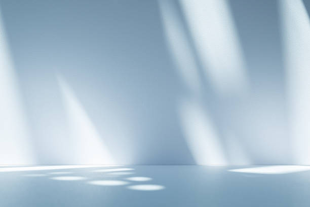istock Studio style background wall decoration presentation uses white and blue tones. with shadows cast from a nearby window, concept creating a decorative 2208416685