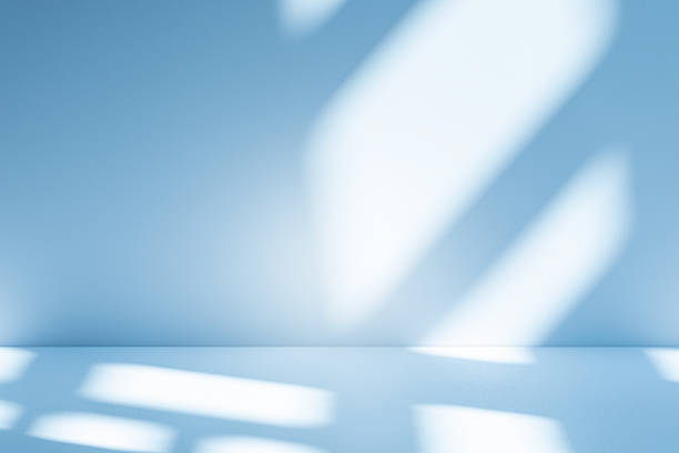 istock Studio style background wall decoration presentation uses white and blue tones. with shadows cast from a nearby window, concept creating a decorative 2208416696