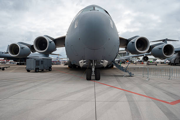istock Large Military Cargo Aircraft on Display at an Air Show 2208423049