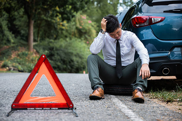 istock Businessman worried car broken. 2208427334