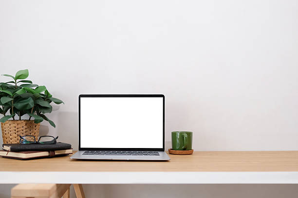 istock White work desk and free space on the right front view 2208428825