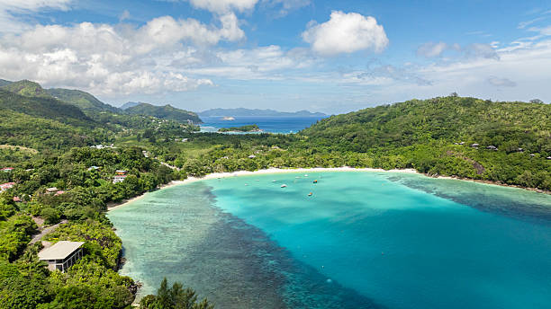 istock Tranquil lagoon surrounded by vibrant greenery. Seychelles. 2208431552