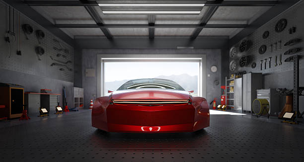 istock 3D Red sportscar parked inside garage ready for maintenance repair or customization 2208434101