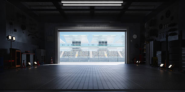 istock 3D Large garage door opening onto crowded stadium with spectators cheering 2208434105