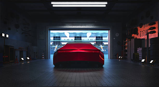 istock 3D Red sports car parked in garage facing crowded stadium getting ready for race 2208434107