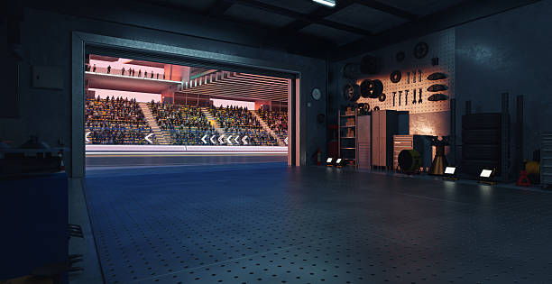 istock 3D Racing stadium seen from garage with open roller door 2208434793
