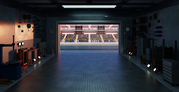 istock 3D Garage opening onto a crowded stadium during a race event 2208434795