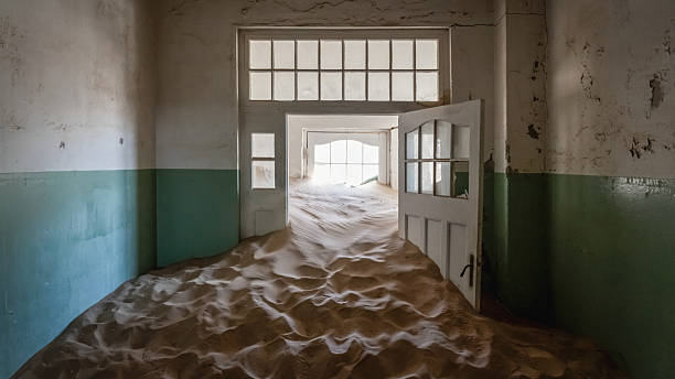 istock Namibia Ghost Town Abandoned Hospital Corridor Filled with Desert Sand 2208436623
