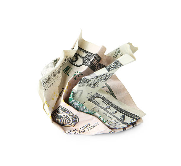 istock One crumpled dollar banknote isolated on white 2208437914