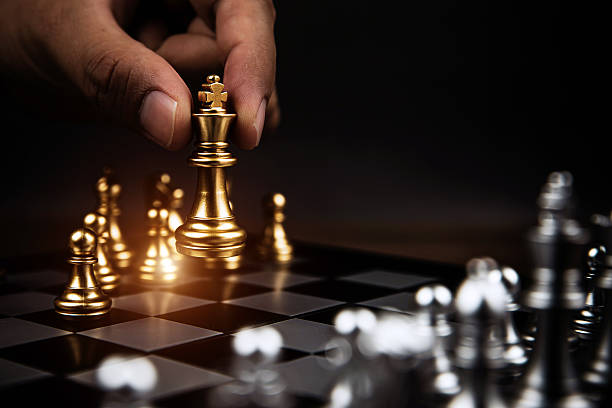 Computer generated 3D illustration of two 3D figures with chess game