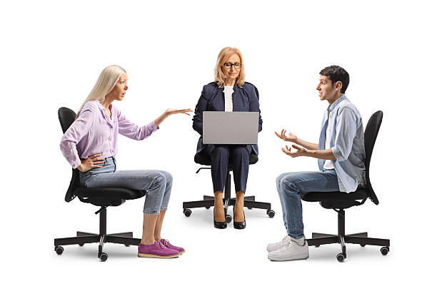 istock Couple arguing at marriage counselling, social worker using a laptop computer 2208443517