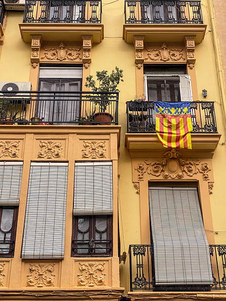 istock Valencian flag hanging from balcony 2208448529