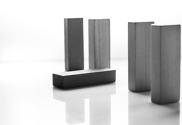 Best, Female hand playing with four wooden blocks