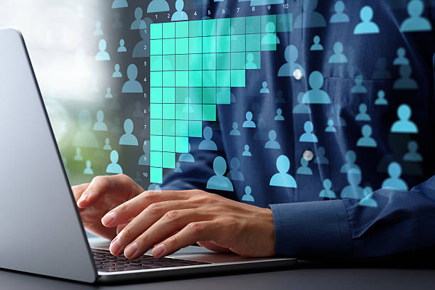 istock Cohort retention analysis of customer behavior data. Marketing analytics of customer lifetime value. Marketer analyzing data with using laptop computer at desk in office. 2208458272