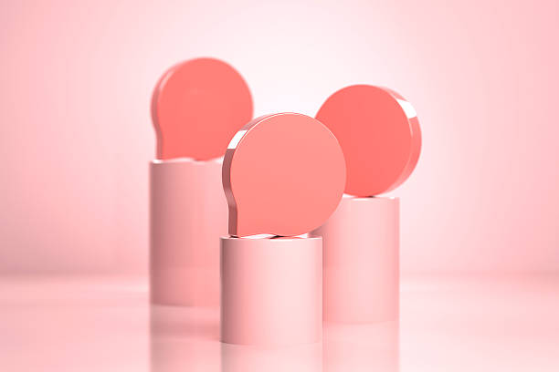 Speech Bubble Sitting On Pink Podium With Pink Background. Icons Concept.