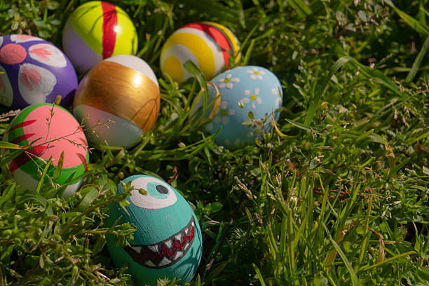 Close-up Colorful Easter eggs on green grass