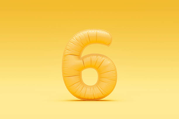 istock Number 6 balloon on yellow background 2208467478
