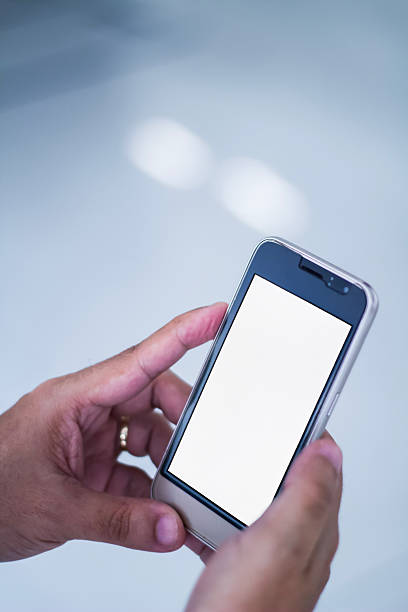 istock Human Hand using smartphone mobile phone with social media concept. 2208470050
