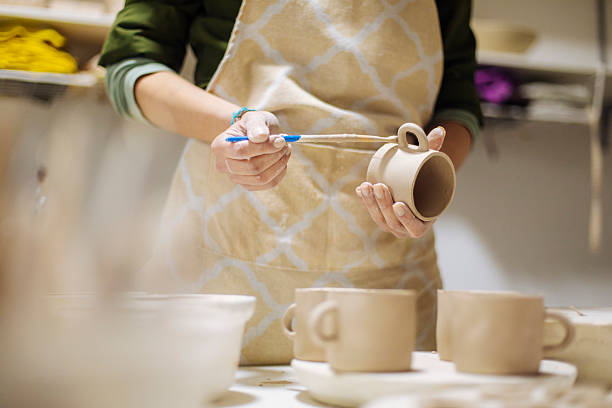 istock Female Artist Removing Fresh Clay from Mold in Studio 2208471513